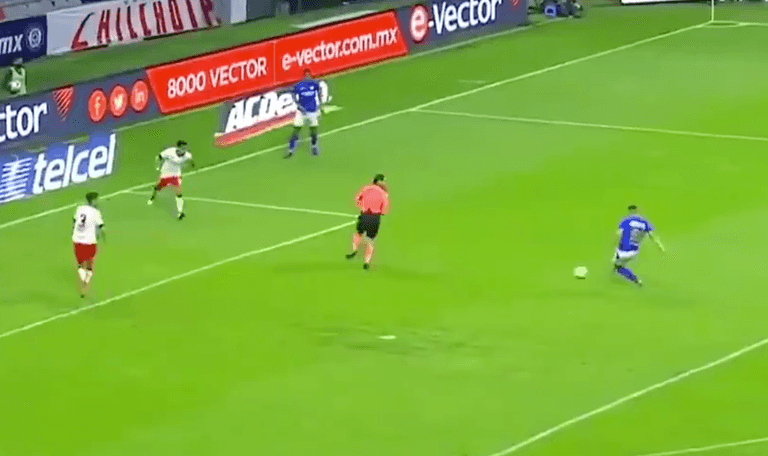 Mexican referee waves play on after accidentally blocking goal-bound shot