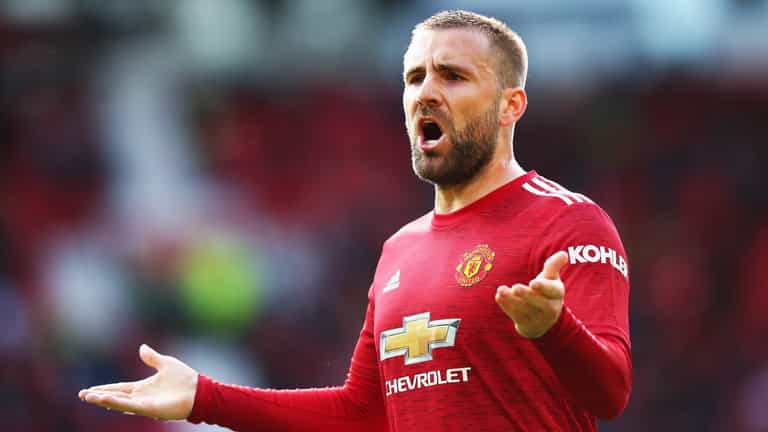 Luke Shaw stands up for United fan who threw a scarf at him