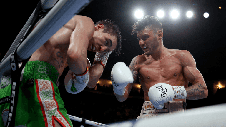 Michael Conlan falls out of the ring in final round KO defeat to Leigh Wood
