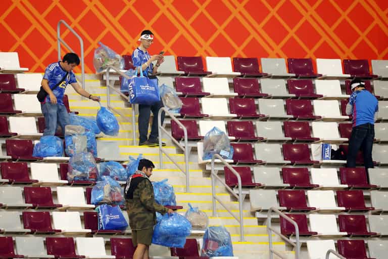 Japan supporters clean up rubbish following famous win over Germany