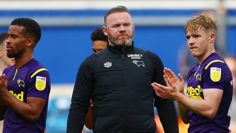 Defiant Wayne Rooney addresses Derby fans at training ground after relegation Defiant Wayne Rooney addresses Derby fans at training ground after relegation