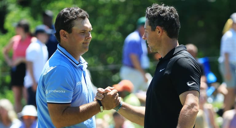 Patrick Reed lobs a tee at Rory McIlory after being blanked by the Down man in Dubai Patrick Reed lobs a tee at Rory McIlory after being blanked by the Down man in Dubai
