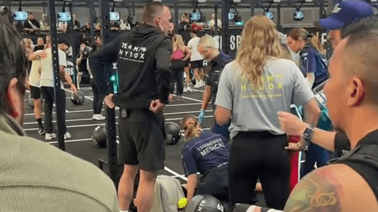 Hyrox athlete completes race while girlfriend is treated by paramedics sparking huge debate