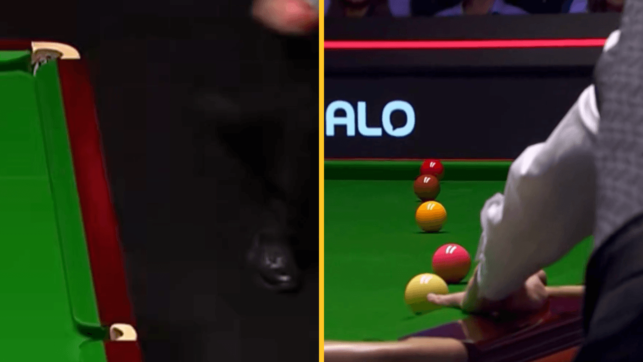 Spectator interrupts World Snooker final after jumping barrier