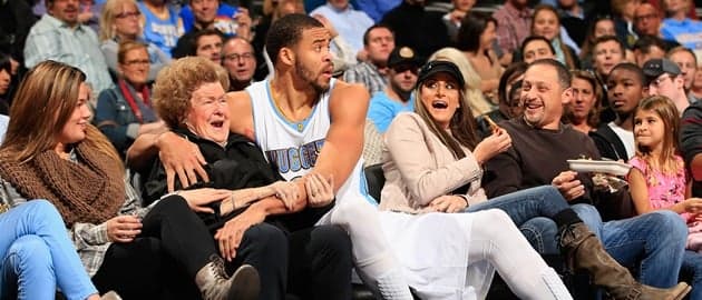 NBA star plants a smacker on lucky fan after crash-landing into crowd NBA star plants a smacker on lucky fan after crash-landing into crowd