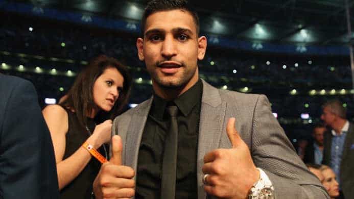 Amir Khan one win from getting whooped by Mayweather or Pacquiao, claims De La Hoya Amir Khan one win from getting whooped by Mayweather or Pacquiao, claims De La Hoya