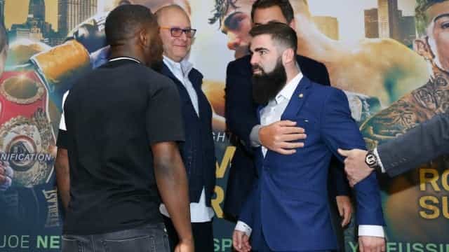 Jono Carroll had to be held back after fiery staredown with Tevin Farmer Jono Carroll had to be held back after fiery staredown with Tevin Farmer