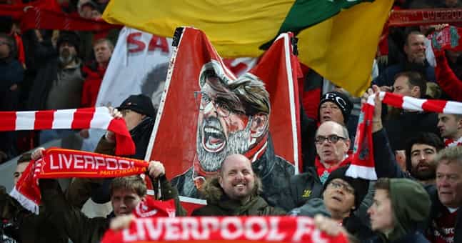 Police launch investigation after Liverpool fans were hit by coins Police launch investigation after Liverpool fans were hit by coins
