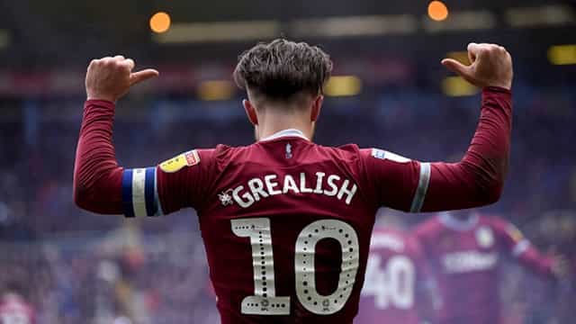 Birmingham City steward appears to be led away by police during Jack Grealish goal celebrations Birmingham City steward appears to be led away by police during Jack Grealish goal celebrations