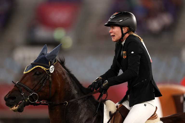 German pentathlon coach thrown out of Tokyo Games for ‘punching a horse’ German pentathlon coach thrown out of Tokyo Games for ‘punching a horse’