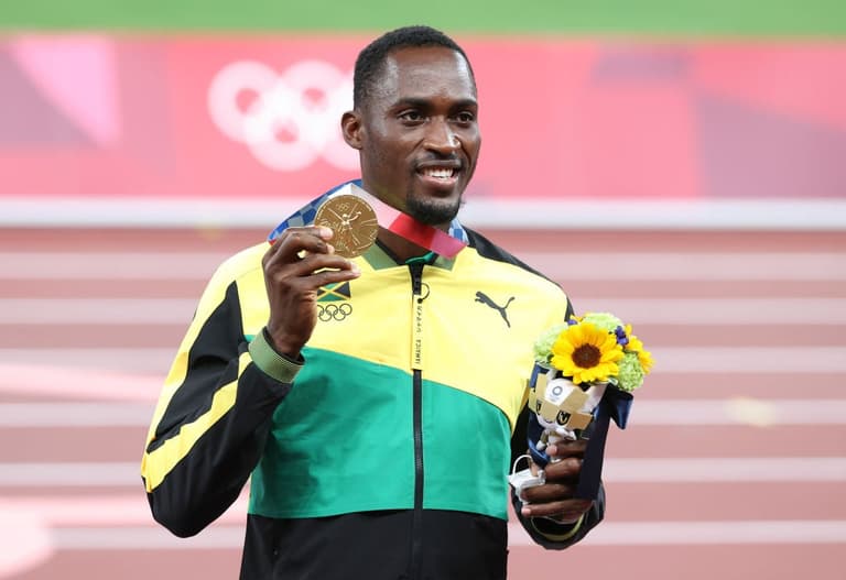 Jamaican gold medalist tracks down volunteer who gave him taxi money to Olympic race Jamaican gold medalist tracks down volunteer who gave him taxi money to Olympic race