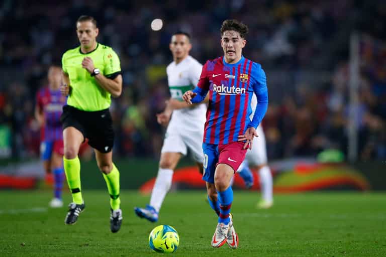 Why does Barcelona midfielder Gavi play with his laces undone? Why does Barcelona midfielder Gavi play with his laces undone?