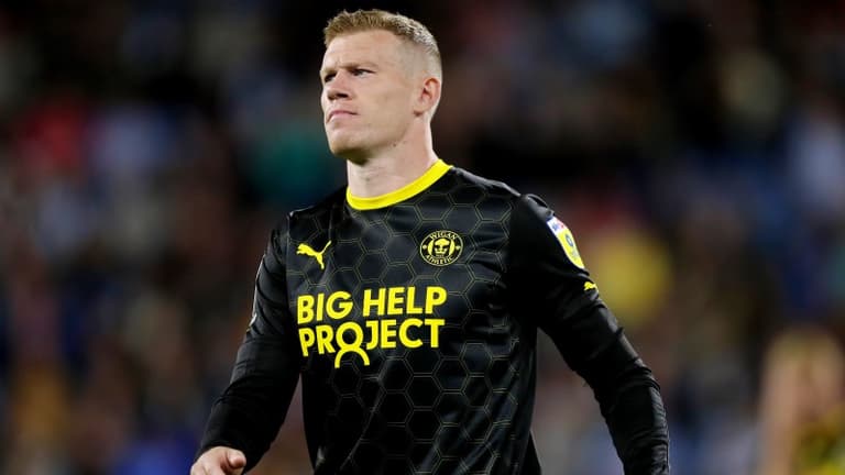 Two James McClean images tell clearer story of pre-match tribute to Queen Elizabeth II Two James McClean images tell clearer story of pre-match tribute to Queen Elizabeth II