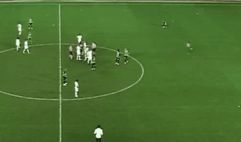 Furious Besiktas fan storms the pitch and drop kicks player Furious Besiktas fan storms the pitch and drop kicks player
