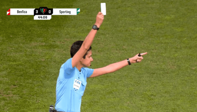 Referee shows white card during Sporting Lisbon vs Benfica Referee shows white card during Sporting Lisbon vs Benfica