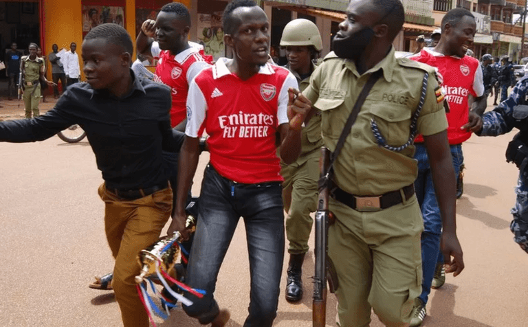 Arsenal fans arrested in Uganda for celebrating Man United win Arsenal fans arrested in Uganda for celebrating Man United win