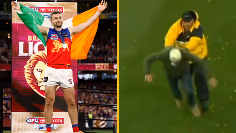 Irish AFL star’s dad tackled by security after pitch invasion Irish AFL star’s dad tackled by security after pitch invasion